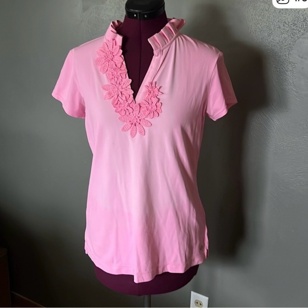 Lilly Pulitzer size medium has ruffles. Pink